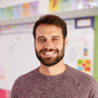 Portrait Of Male Elementary School Teacher Standin 2026 01 05 06 30 50 Utc